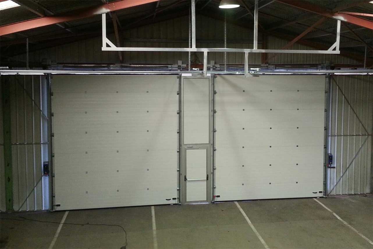 Metal Garden XL porte sectionnelle industrielle lisse 7000x3000 mm